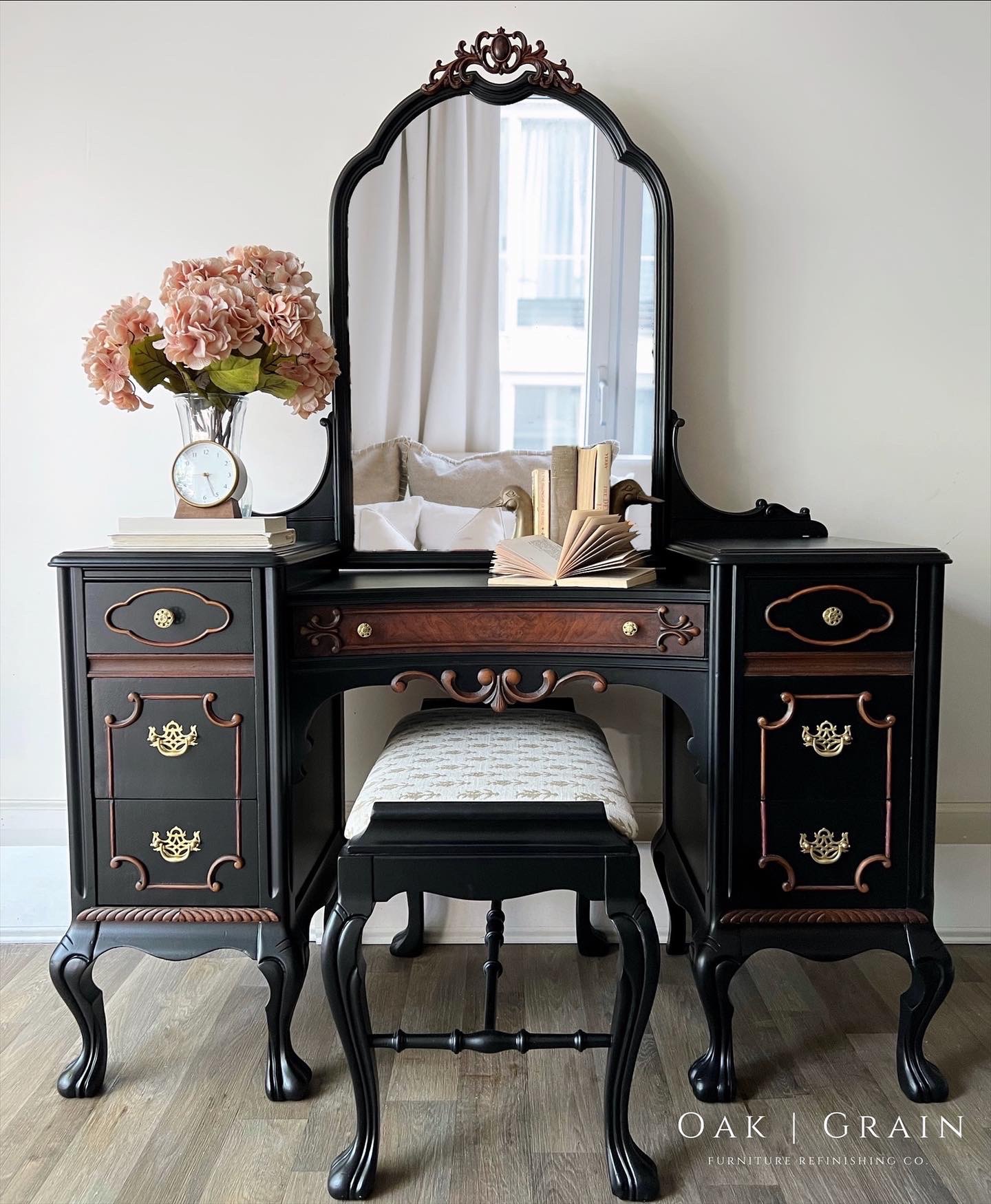 black painted vanity with mirror and stool